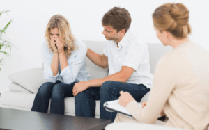 couple in meeting with an adviser