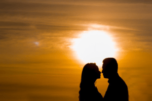 A couple standing close to each other