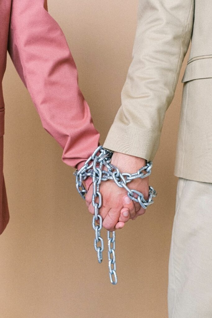 A couple holding hands