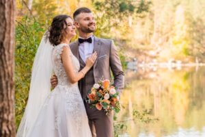 A newly married couple posing for a photoshoot
