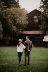 A couple walking in a garden