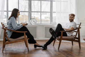A woman and man sitting