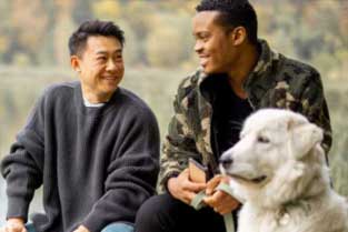 Same-sex couple enjoying time outdoors with their dog in Silicon Valley