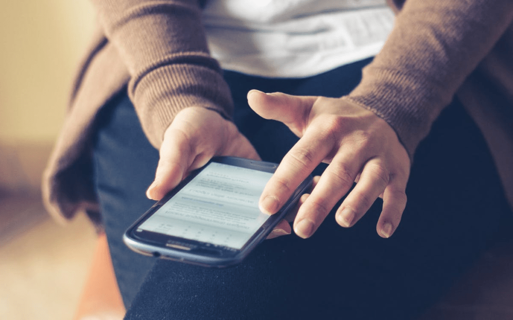 person texting multiple sexual partners
