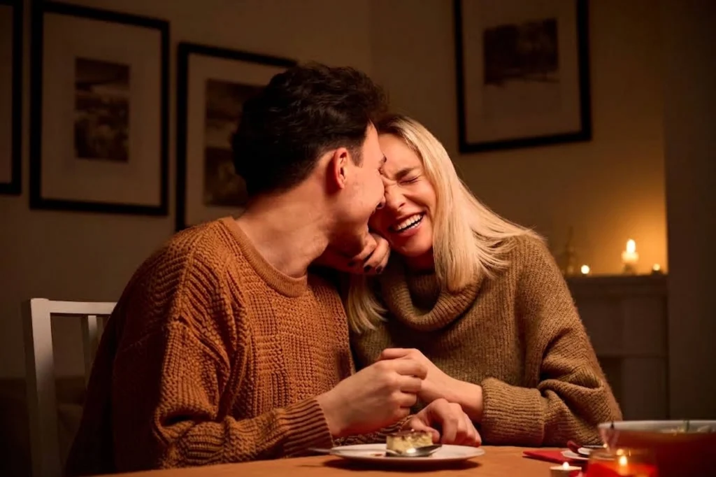 Couples counseling in Beaverton, Oregon: a couple laughing together, relaxed and close